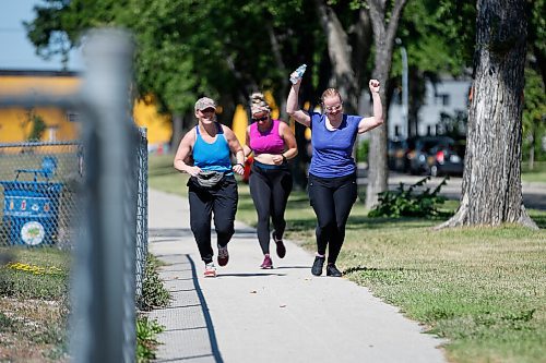 JOHN WOODS / WINNIPEG FREE PRESS
Johanna Theroux, from left, Kahleigh Krochak and Natalie Thiessen make their way to the finish line at Burton Cummings Community Centre in the Prairie Province Prisoner Support half marathon fundraising run in Winnipeg Sunday, August 16, 2020. The fundraiser has raised more than $41,000 to assist prisoners.

Reporter: Ben