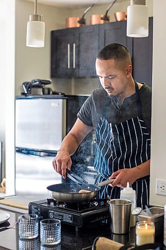 MIKAELA MACKENZIE / WINNIPEG FREE PRESS

Joshua Zacharias, one of the chefs behind Stefan (a high-end supper club run out of his downtown apartment), makes quail two ways in Winnipeg on Monday, Aug. 17, 2020. For Eva Wasney story.
Winnipeg Free Press 2020.