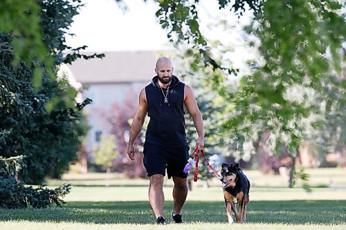 JOHN WOODS / WINNIPEG FREE PRESS
Ryan Caligiuri, who caught COVID-19 while on vacation in Cabo, is photographed with his dog Roxy in a park near his home in Winnipeg Monday, August 17, 2020. 

Reporter: Kellen