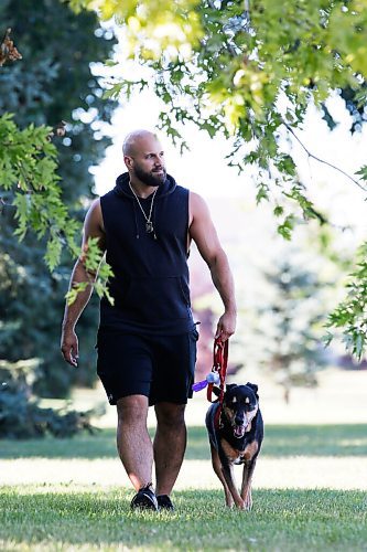 JOHN WOODS / WINNIPEG FREE PRESS
Ryan Caligiuri, who caught COVID-19 while on vacation in Cabo, is photographed with his dog Roxy in a park near his home in Winnipeg Monday, August 17, 2020. 

Reporter: Kellen