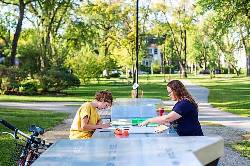 MIKAELA MACKENZIE / WINNIPEG FREE PRESS

Natalie Baird (left) and Ariel Gordon work on their ongoing draw/write project, the Pandemic Papers, at Vimy Ridge Park in Winnipeg on Tuesday, Aug. 18, 2020. For arts story.
Winnipeg Free Press 2020.