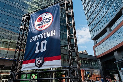 JESSE BOILY  / WINNIPEG FREE PRESS
The Dale Hawerchuk, former Winnipeg Jet, banner was brought down from the rafters and put on display in True North Square to memorialize the Jet on Tuesday. Tuesday, Aug. 18, 2020.
Reporter: