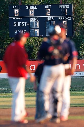 JOHN WOODS / WINNIPEG FREE PRESS
Elmwood Giants talk on the mound in the first inning against the Interlake Blue Jays in game 2 of the Manitoba Junior Baseball League playoffs in Stonewall Tuesday, August 18, 2020. 

Reporter: Bell