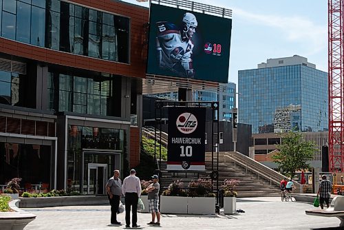 JESSE BOILY  / WINNIPEG FREE PRESS
The Dale Hawerchuk Memorial receives flowers and hockey sticks at True North Square on Wednesday. Wednesday, Aug. 19, 2020.
Reporter: