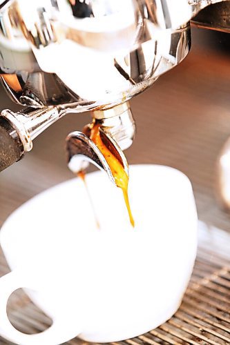 JOHN WOODS / WINNIPEG FREE PRESS
Rae de Sousa, manager at Harrisons Coffee Co., makes a latte at Al Dawsons new coffee shop and roaster on Waterfront Drive in Winnipeg Tuesday, August 19, 2020. 

Reporter: Durrani