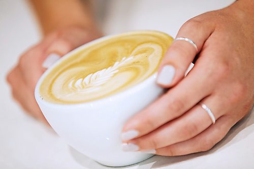 JOHN WOODS / WINNIPEG FREE PRESS
Rae de Sousa, manager at Harrisons Coffee Co., makes a latte at Al Dawsons new coffee shop and roaster on Waterfront Drive in Winnipeg Tuesday, August 19, 2020. 

Reporter: Durrani