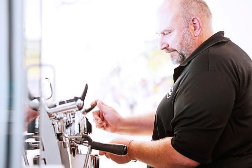 JOHN WOODS / WINNIPEG FREE PRESS
Al Dawson, owner of Harrisons Coffee Co., makes a latte at his new coffee shop and roaster on Waterfront Drive in Winnipeg Tuesday, August 19, 2020. 

Reporter: Durrani