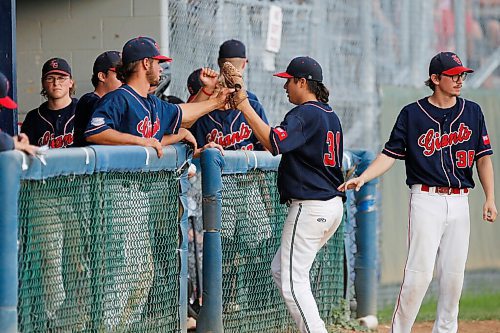 JOHN WOODS / WINNIPEG FREE PRESS
Elmwood Giants high-five eachother as they play Interlake Blue Jays in game 3 of the Manitoba Junior Baseball League playoffs in Winnipeg Wednesday, August 19, 2020. 

Reporter: Bell