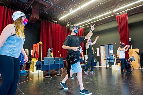 MIKAELA MACKENZIE / WINNIPEG FREE PRESS

Jessica McGlynn (left), Josh Ranville, Aqqalu Meekis, and Sara Demers rehearse a hip-hop scene in the play Songidewin at the Théâtre Cercle Molière in Winnipeg on Thursday, Aug. 20, 2020. For Frances Koncan story.
Winnipeg Free Press 2020.