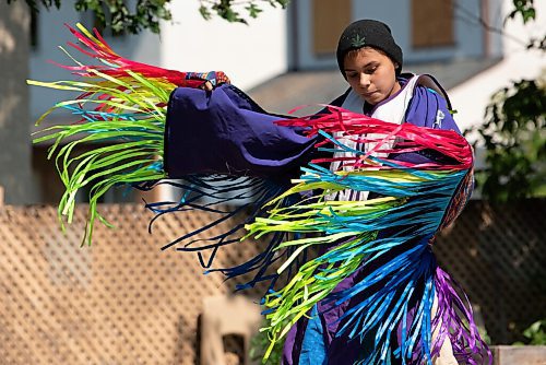 JESSE BOILY  / WINNIPEG FREE PRESS
Callie Starr, 14, dances at the 1JustCity socially distanced Pow Wow during the lunch hour at Agnes Street and St Matthews on Thursday. Guests were asked to enjoy their lunches and watch in stead of joining in like previous years due to social distancing measures. Thursday, Aug. 20, 2020.
Reporter: Standup