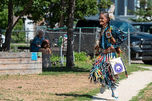 JESSE BOILY  / WINNIPEG FREE PRESS
Sherry Starr dances at the 1JustCity socially distanced Pow Wow during the lunch hour at Agnes Street and St Matthews on Thursday. Guests were asked to enjoy their lunches and watch in stead of joining in like previous years due to social distancing measures. Thursday, Aug. 20, 2020.
Reporter: Standup