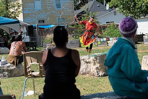 JESSE BOILY  / WINNIPEG FREE PRESS
Shanley Spence dances at the 1JustCity socially distanced Pow Wow during the lunch hour at Agnes Street and St Matthews on Thursday. Guests were asked to enjoy their lunches and watch in stead of joining in like previous years due to social distancing measures. Thursday, Aug. 20, 2020.
Reporter: Standup