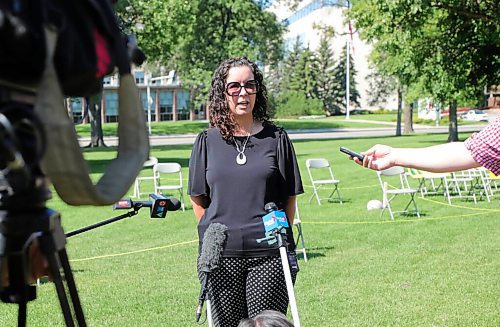 RUTH BONNEVILLE / WINNIPEG FREE PRESS

Local  - Safe September MB demonstration protest. 

Photo of Rhonda Hinther, speaking to the media at the event.   

 #SafeSeptemberMB  hold a Physically-Distanced Classroom Demonstration on the Manitoba Legislative Grounds on Thursday,  at 12 noon.

Spokespersons from the group had heir children  sit physically distanced, some wearing masks,  on chairs, 2 metres apart in  "classroom formation with 30 chairs" to demonstrate how much space is needed for a full classroom of students to learn safely. 
 
A number of Safe September MB spokespeople, including teachers, were available at the event to speak to the media including teacher, Scott During and Rhonda Hinther.  
 
See story. 

Aug 20th, 2020
