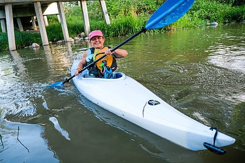 Daniel Crump / Winnipeg Free Press. Sandy Hudson, the founding member and organizer of Experience Manitoba paddles her kayak on the Seine river. Hudson purchased her kayak as a way to keep busy during the COVID-19 pandemic. August 20, 2020.
