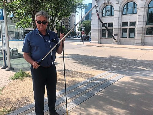 JOYANNE PURSAGA / Winnipeg Free Press
Coun. Ross Eadie (Mynarski) displays his broken cane to media on Friday, Aug. 21, 2020. Eadie, who is legally blind, is calling on cyclists to stop riding on busy sidewalks or at least slow down and be cautious near pedestrians after his cane was damaged in a collision with a cyclist on Aug. 20, 2020.