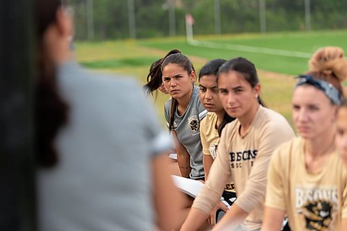 JESSE BOILY  / WINNIPEG FREE PRESS
Bruna Mavignier, who is part of the U Sports Apprenticeship Coaching Program, listens to head coach Vanessa Martinez Lagunas at a Bisons soccer practice at the University of Manitoba on Friday. Friday, Aug. 21, 2020.
Reporter: