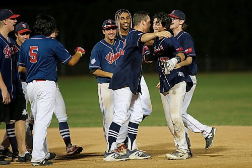 JOHN WOODS / WINNIPEG FREE PRESS
Elmwood Giants Zach Delaquis (35), right, celebrates defeating the Altona Bisons in game three of the final of the Manitoba Junior Baseball championships in Winnipeg Monday, August 24, 2020. Elmwood defeated  Altona three games to zero.

Reporter: Bell
