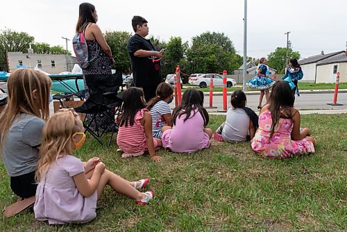 JESSE BOILY  / WINNIPEG FREE PRESS
Children watch dancers after the ground breaking ceremony for the new Little Stars playground on Selkirk Ave. on Tuesday. Tuesday, Aug. 25, 2020.
Reporter: Standup