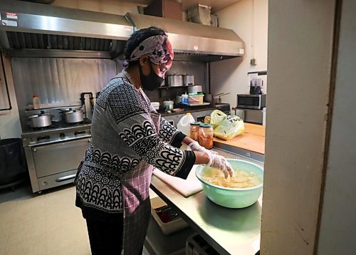 RUTH BONNEVILLE / WINNIPEG FREE PRESS

Sunnday Special - Harman's Cafe at 570 Sargent Ave

Photos and portraits of Desta Worku Negatu preparing some Ethiopian favourites in the kitchen, shots of finished dishes in the restaurant (currently only open for pickup and takeout), exterior shots etc., for story. 

Description:
This is for a two-page Sunday Special on Harman's Cafe, an Ethiopian favourite in Winnipeg's West End. Owner, Desta Worku Negatu, has quite the story; she grew up in Ethiopia, escaped her homeland in '83 during the war at the age of 16 - 14 of 20 companions perished during the escape - and lived in Djibouti for three years, training to become a nurse. 
She moved to Canada in the late 90s to continue her studies but after popping into Harman's Cafe, a Portage Ave. lunch counter, one day for breakfast, she was hired to work there as a server, eventually taking over as manager. 
She opened a spot of her own in '09, dubbing it Harman's Cafe as a nod to her start in the biz. 
Reporter: Dave Sanderson

 Aug 25th, 2020