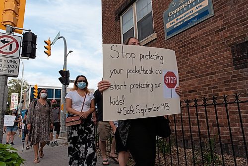 JESSE BOILY  / WINNIPEG FREE PRESS
People gathered outside of the Legislative building and were demanding a full and comprehensive plan for back-to-school on Thursday. They then marched down Broadway to Vimy Ridge park. Thursday, Aug. 27, 2020.
Reporter: Piche