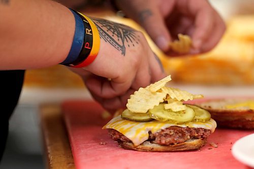 SHANNON VANRAES/WINNIPEG FREE PRESS
Chef Ashley Hebel prepares The Frenchway's Le Burger Week contender, the Manitoba Social, on Friday August 28, 2020.