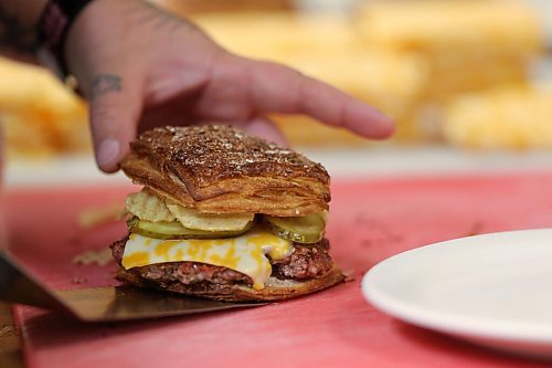 SHANNON VANRAES/WINNIPEG FREE PRESS
Chef Ashley Hebel prepares The Frenchway's Le Burger Week contender, the Manitoba Social, on Friday August 28, 2020.