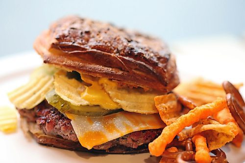 SHANNON VANRAES/WINNIPEG FREE PRESS
Chef Ashley Hebel prepares The Frenchway's Le Burger Week contender, the Manitoba Social, on Friday August 28, 2020.