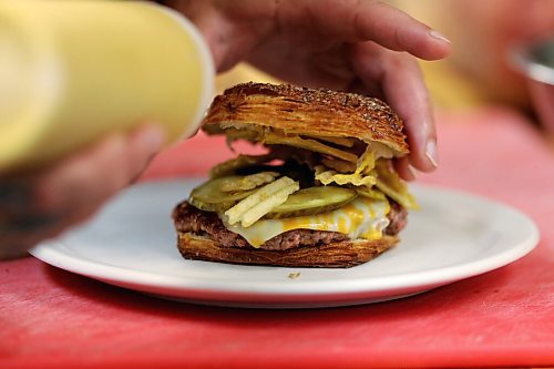 SHANNON VANRAES/WINNIPEG FREE PRESS
Chef Ashley Hebel prepares The Frenchway's Le Burger Week contender, the Manitoba Social, on Friday August 28, 2020.