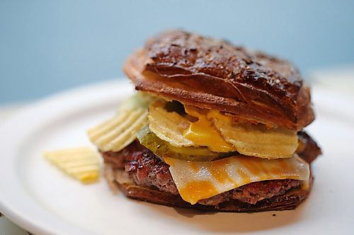 SHANNON VANRAES/WINNIPEG FREE PRESS
Chef Ashley Hebel prepares The Frenchway's Le Burger Week contender, the Manitoba Social, on Friday August 28, 2020.