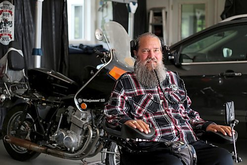 SHANNON VANRAES/WINNIPEG FREE PRESS
Neil Klippenstein continues to ride motorcycles, despite a catastrophic crash, thanks to the addition of a sidecar and hoist system MPI helped provide. He was photographed at his home near Winnipeg on August 28, 2020.