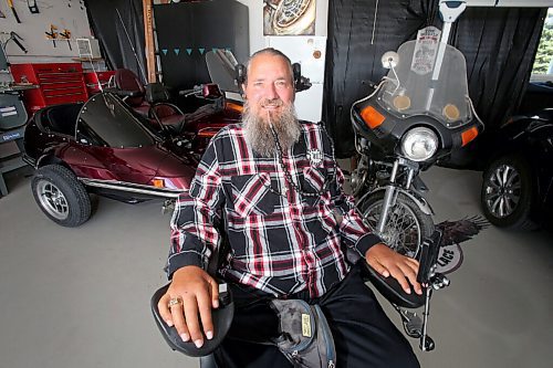 SHANNON VANRAES/WINNIPEG FREE PRESS
Neil Klippenstein has continues to ride motorcycles, despite a catastrophic crash, thanks to the addition of a sidecar and hoist system MPI helped provide. He was photographed at his home near Winnipeg on August 28, 2020.