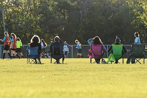 Mike Sudoma / Winnipeg Free Press
Spectators keep their distance as they watch a U14 soccer game Monday evening
August 31, 2020