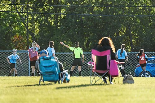 Mike Sudoma / Winnipeg Free Press
Spectators keep their distance as referees are now keeping tabs on social distancing practices as instructed by the MSA Monday.
August 31, 2020