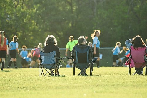 Mike Sudoma / Winnipeg Free Press
Spectators keep their distance as they watch a U14 soccer game Monday evening
August 31, 2020