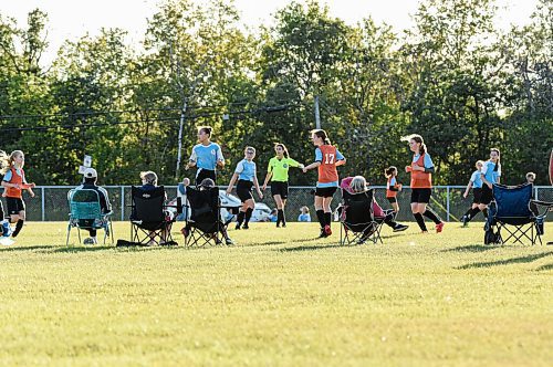 Mike Sudoma / Winnipeg Free Press
Spectators keep their distance as they watch a U14 soccer game Monday evening
August 31, 2020