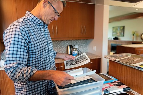 JESSE BOILY  / WINNIPEG FREE PRESS
Scott Lakusiak, son of former Bomber star Gene Lakusiak, goes through old photos of his father at his parents home on Tuesday. Tuesday, Sept. 1, 2020.
Reporter: Doug