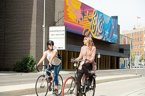 Mike Sudoma / Winnipeg Free Press
Cycling enthusiast, Erin Riedger (right) and Winnipeg Free Press reporter, Eva Wasney (left) rides their bikes down a bike path on Garry St while they take a ride around downtown Winnipeg Wednesday afternoon.
September 2, 2020