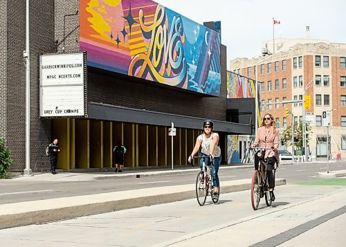 Mike Sudoma / Winnipeg Free Press
Cycling enthusiast, Erin Riedger (right) and Winnipeg Free Press reporter, Eva Wasney (left) rides their bikes down a bike path on Garry St while they take a ride around downtown Winnipeg Wednesday afternoon.
September 2, 2020