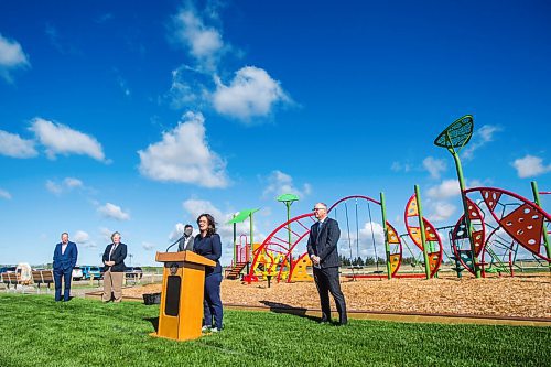 MIKAELA MACKENZIE / WINNIPEG FREE PRESS

Councillor Sherri Rollins speaks as St. James Assiniboia Minor Baseball Association representative Brad Peacock, Assiniboia MLA Scott Johnston, mayor Brian Bowman, and St. James councillor Scott Gillingham listen at a ribbon cutting for the Optimist Park expansion in Winnipeg on Thursday, Sept. 3, 2020. For Joyanne story.
Winnipeg Free Press 2020.