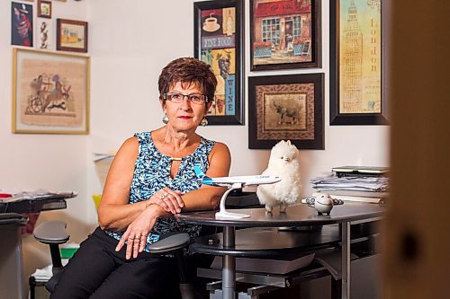 MIKAELA MACKENZIE / WINNIPEG FREE PRESS

Travel agent Christine Ward poses for a portrait in her home office in Winnipeg on Thursday, Sept. 3, 2020. She's been running her otherwise thriving business at a loss because of COVID-19. For Temur story.
Winnipeg Free Press 2020.