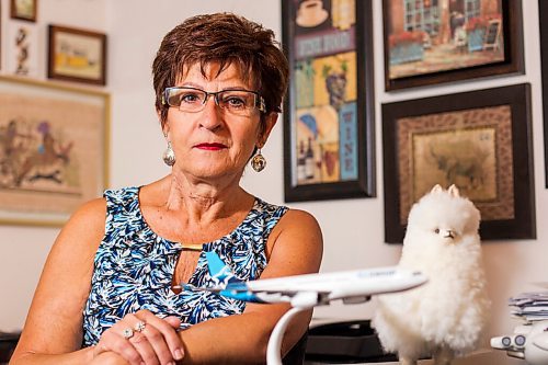 MIKAELA MACKENZIE / WINNIPEG FREE PRESS

Travel agent Christine Ward poses for a portrait in her home office in Winnipeg on Thursday, Sept. 3, 2020. She's been running her otherwise thriving business at a loss because of COVID-19. For Temur story.
Winnipeg Free Press 2020.