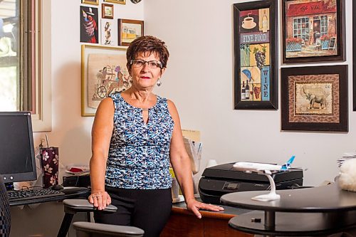 MIKAELA MACKENZIE / WINNIPEG FREE PRESS

Travel agent Christine Ward poses for a portrait in her home office in Winnipeg on Thursday, Sept. 3, 2020. She's been running her otherwise thriving business at a loss because of COVID-19. For Temur story.
Winnipeg Free Press 2020.