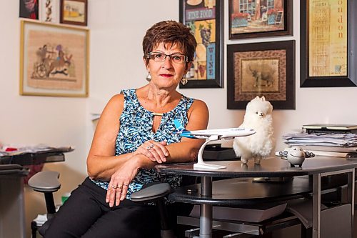 MIKAELA MACKENZIE / WINNIPEG FREE PRESS

Travel agent Christine Ward poses for a portrait in her home office in Winnipeg on Thursday, Sept. 3, 2020. She's been running her otherwise thriving business at a loss because of COVID-19. For Temur story.
Winnipeg Free Press 2020.