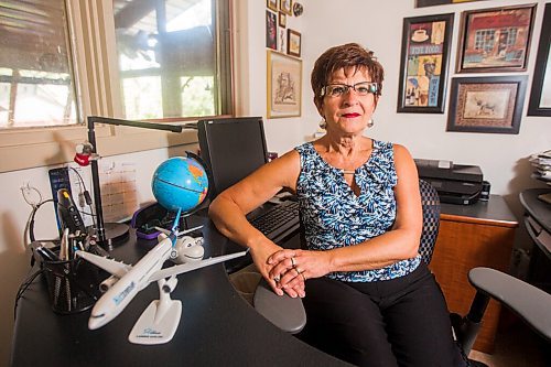 MIKAELA MACKENZIE / WINNIPEG FREE PRESS

Travel agent Christine Ward poses for a portrait in her home office in Winnipeg on Thursday, Sept. 3, 2020. She's been running her otherwise thriving business at a loss because of COVID-19. For Temur story.
Winnipeg Free Press 2020.