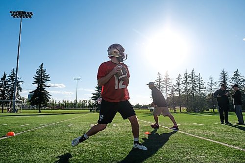 Daniel Crump / Winnipeg Free Press. University of Manitoba Bisons quarterback Des Catellier (12) runs a drill during a team practice at the university. September 3, 2020.