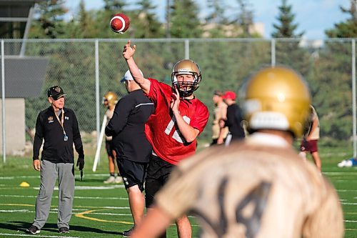 Daniel Crump / Winnipeg Free Press. University of Manitoba Bisons quarterback Des Catellier (12) makes a pass during a team practice at the university. September 3, 2020.