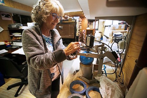 JOHN WOODS / WINNIPEG FREE PRESS
Dorothy Dubinsky engraves a ball in their office in Winnipeg Thursday, September 3, 2020. Her husband Edward Dubinsky took over the bowling services business JD Bowling Services that his father started back in 1972.

Reporter: Sanderson