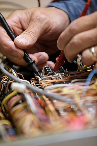 JOHN WOODS / WINNIPEG FREE PRESS
Edward Dubinsky works on a circuit in his workshop in Winnipeg Thursday, September 3, 2020. Dubinsky took over the bowling services business JD Bowling Services that his father started back in 1972.

Reporter: Sanderson