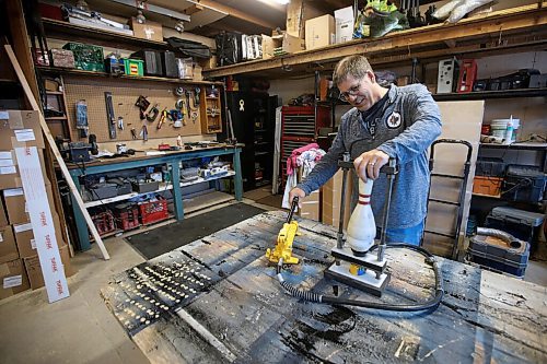 JOHN WOODS / WINNIPEG FREE PRESS
Edward Dubinsky installs a bowling pin bottom in the workshop at their office in Winnipeg Thursday, September 3, 2020. Dubinsky took over the bowling services business JD Bowling Services that his father started back in 1972.

Reporter: Sanderson