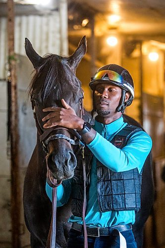 MIKAELA MACKENZIE / WINNIPEG FREE PRESS

Trainer Devon Gittens and horse Purrsistent pose for a portrait at the Assiniboia Downs backstretch in Winnipeg on Friday, Sept. 4, 2020. For George Williams story.
Winnipeg Free Press 2020.